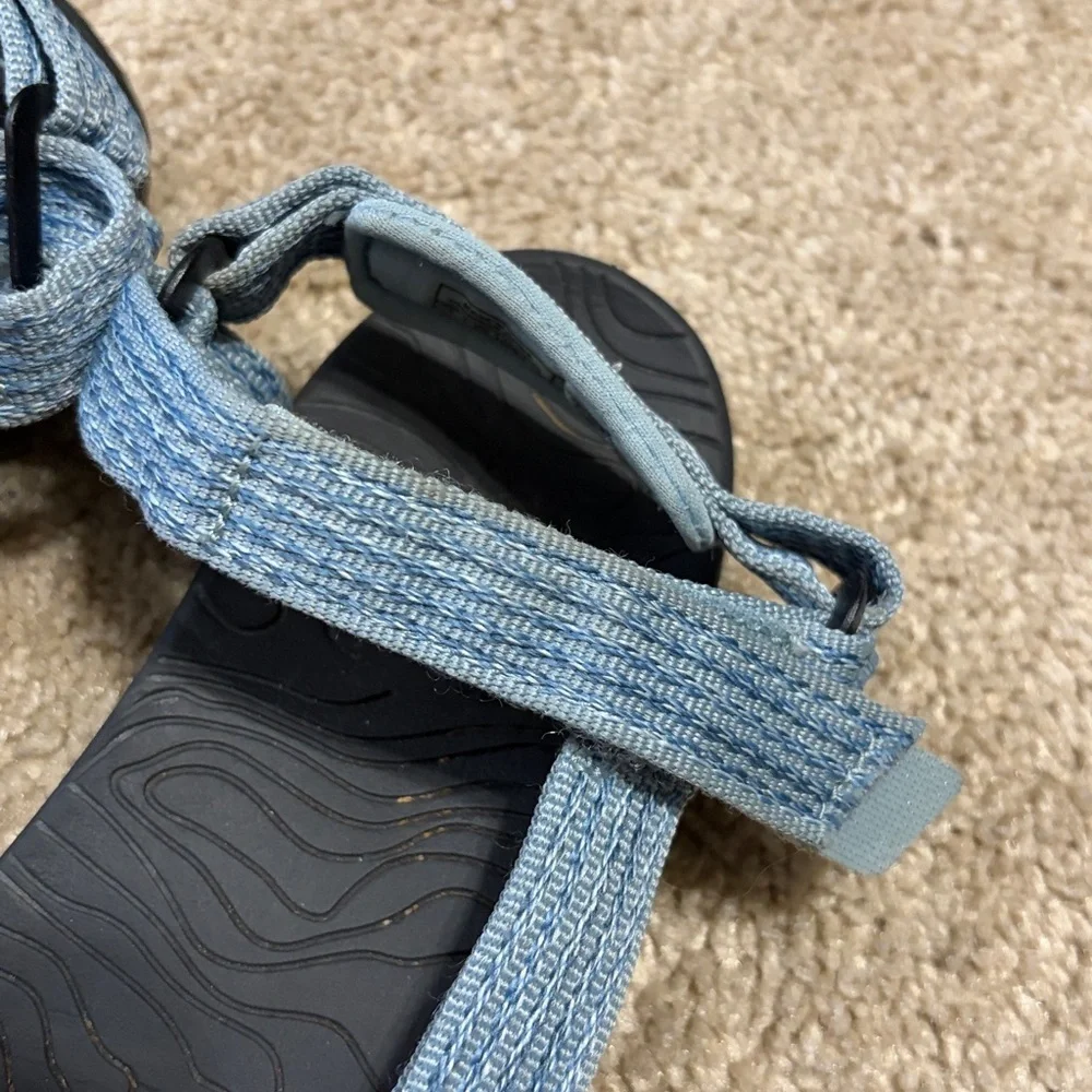 Teva Hurricane XLT2 sandals in a light blue color. Size 2